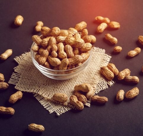 peanuts-bowl-dark-background_96696-151
